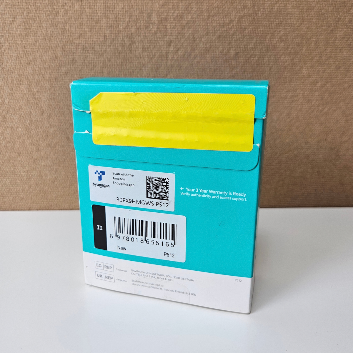 A barcode label and small printed text are visible on the front.