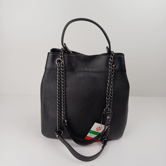 A black leather bucket bag with silver chain straps 