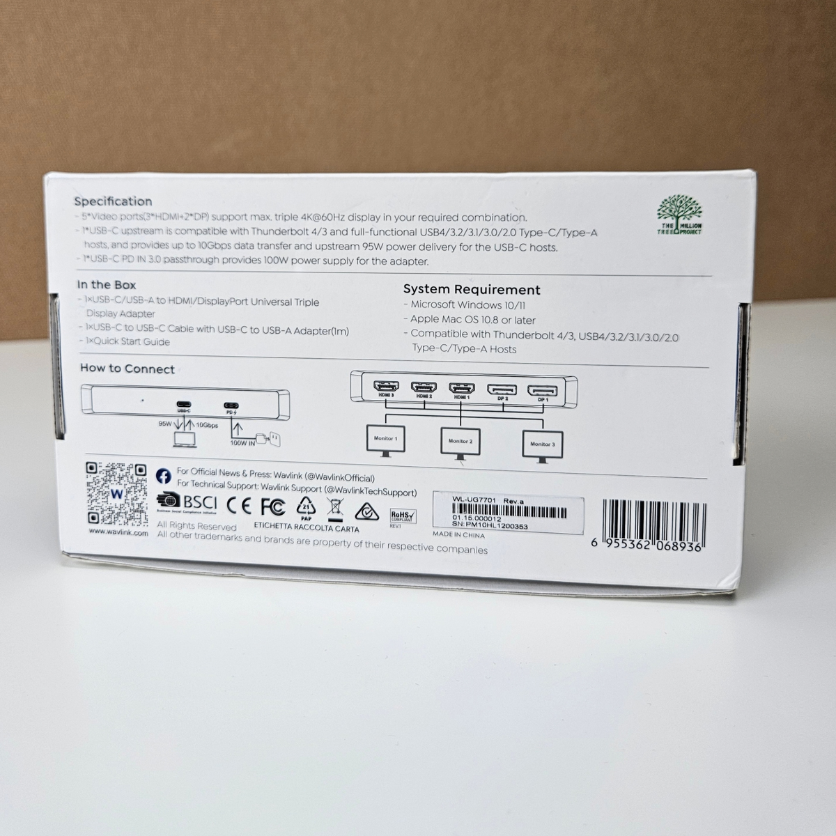 The back of a white product box showing technical specifications, connection diagrams, a QR code, and a barcode on a neutral brown and white background.