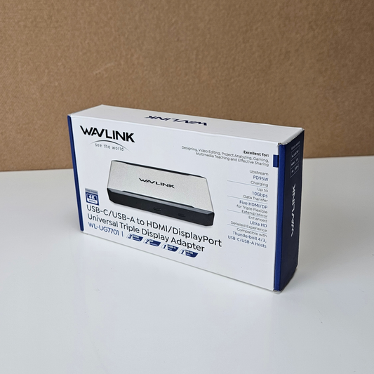 Wavlink WL-VG7901 USB-C to HDMI/DisplayPort universal triple display adapter retail box, shown standing on a white surface against a brown cardboard background.
