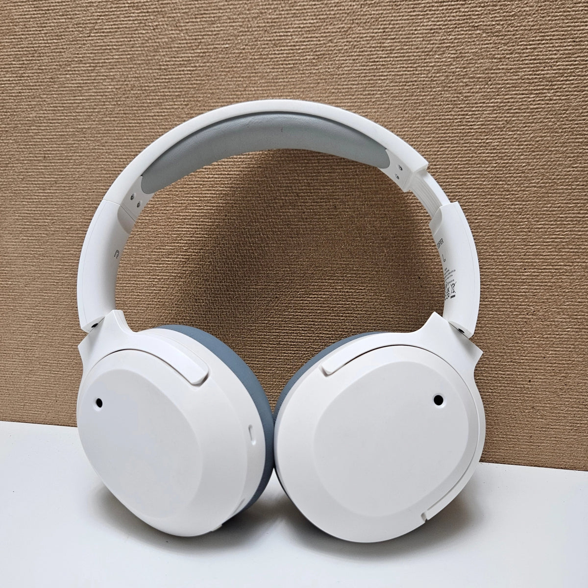 Outer shell view of the matte white earcups on Edifier W820NB Plus headphones