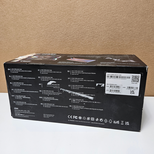 The back of a black retail box for a Msi  featuring technical specifications, regulatory icons, and a barcode sticker on a light surface against a brown cardboard background.