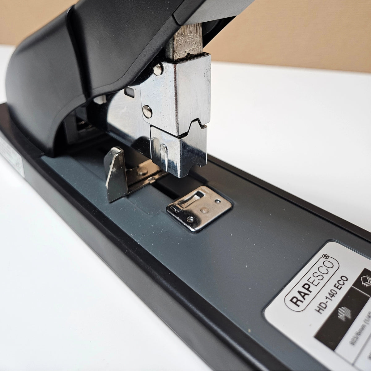 Close-up of the metal stapling mechanism on the Rapesco HD-140 ECO