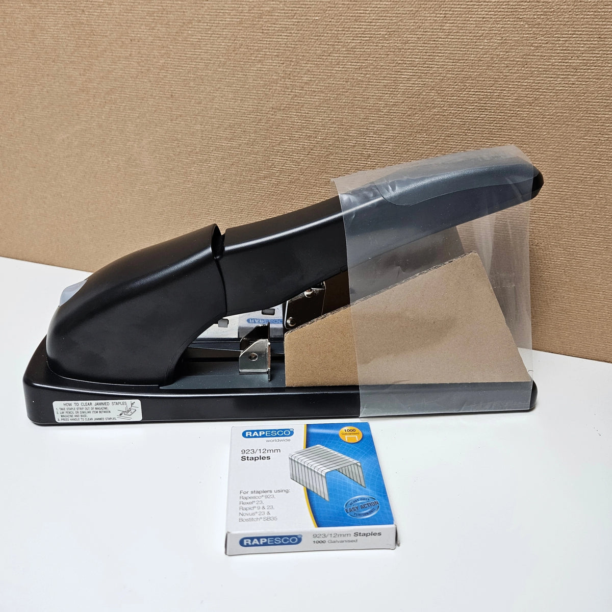Rapesco HD-140 ECO black stapler displayed with a box of 12mm staples