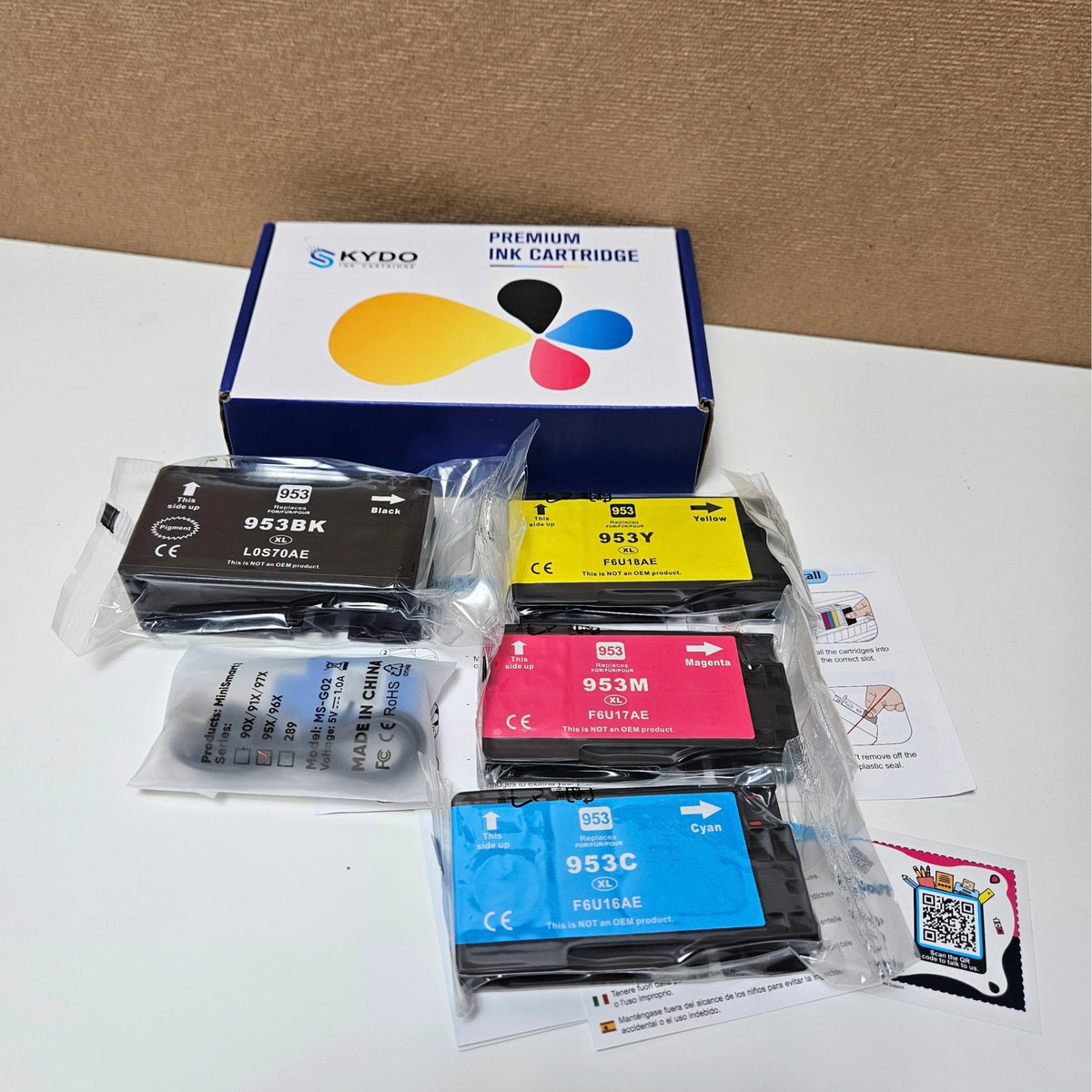 Full set of Skydo 953XL ink cartridges in black, cyan, magenta, and yellow with box