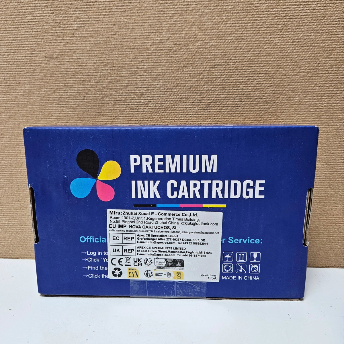 Back of a Skydo premium ink cartridge box showing manufacturer and compliance labels